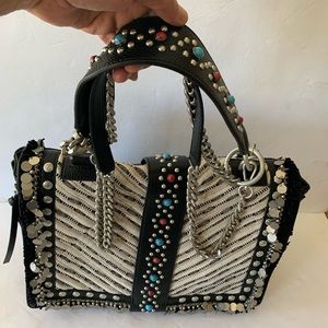 La Carrie (LC) leather unique  limited women bag in perfect condition.